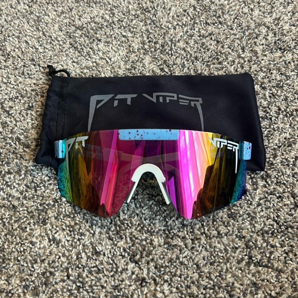 Pit vipers, blue with purple speckles on frames